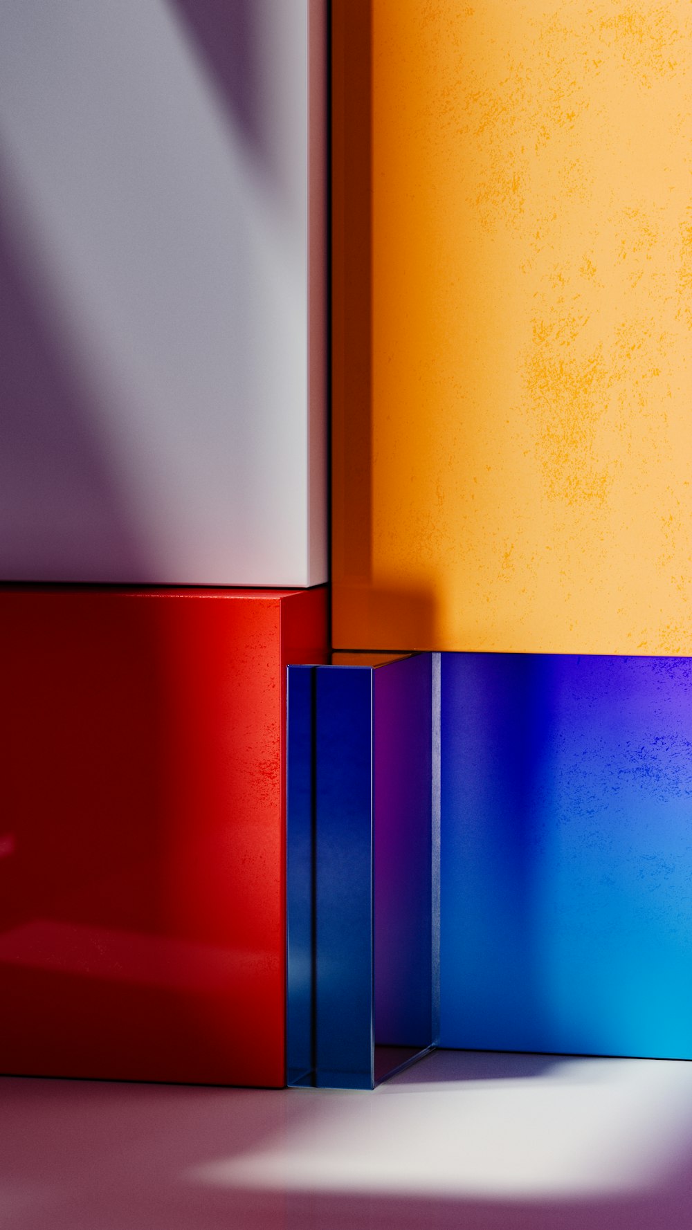 a multicolored wall with a shadow on it