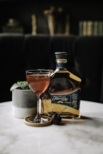 a bottle of liquor sitting on top of a table