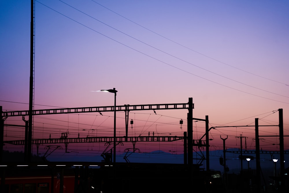 a view of a train station at dusk