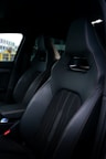 A close-up of a well-maintained vehicle's interior showcasing comfortable seating and modern technology.