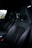 An interior view of a freshly detailed car with spotless seats and dashboard.