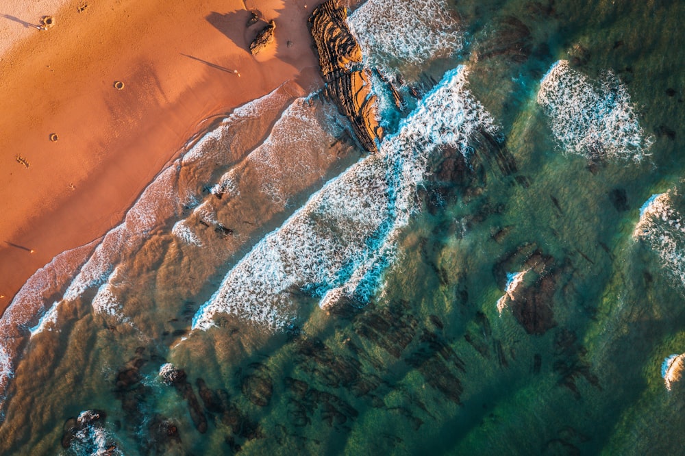 an aerial view of a beach and ocean