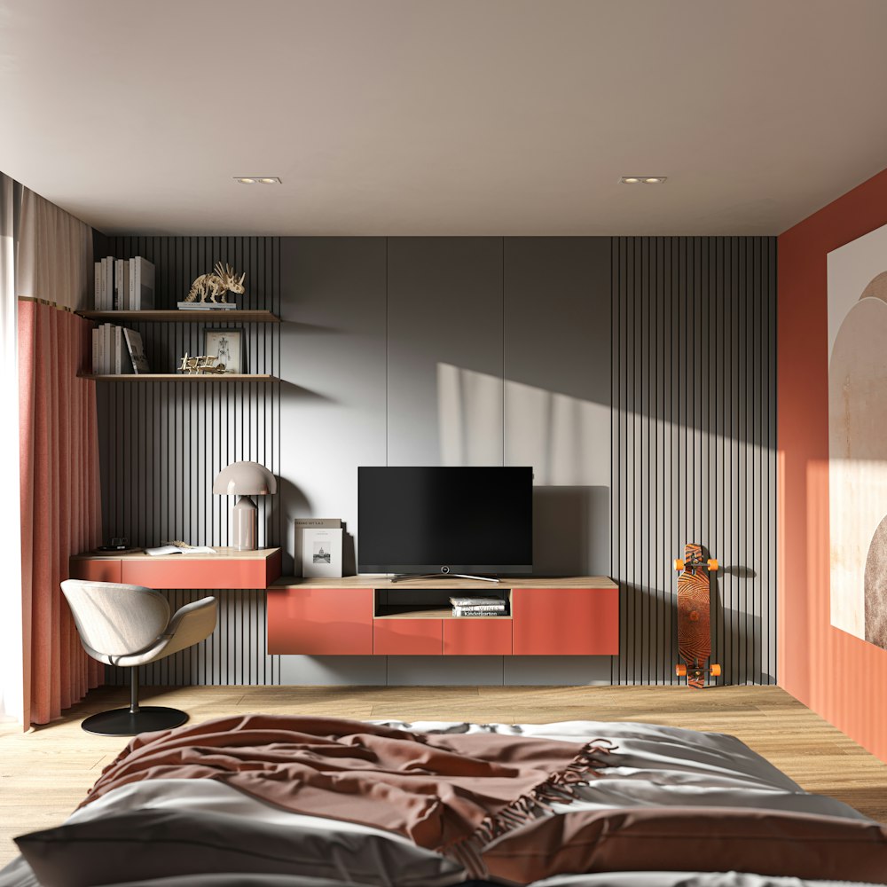 a bedroom with a bed and a television on a stand