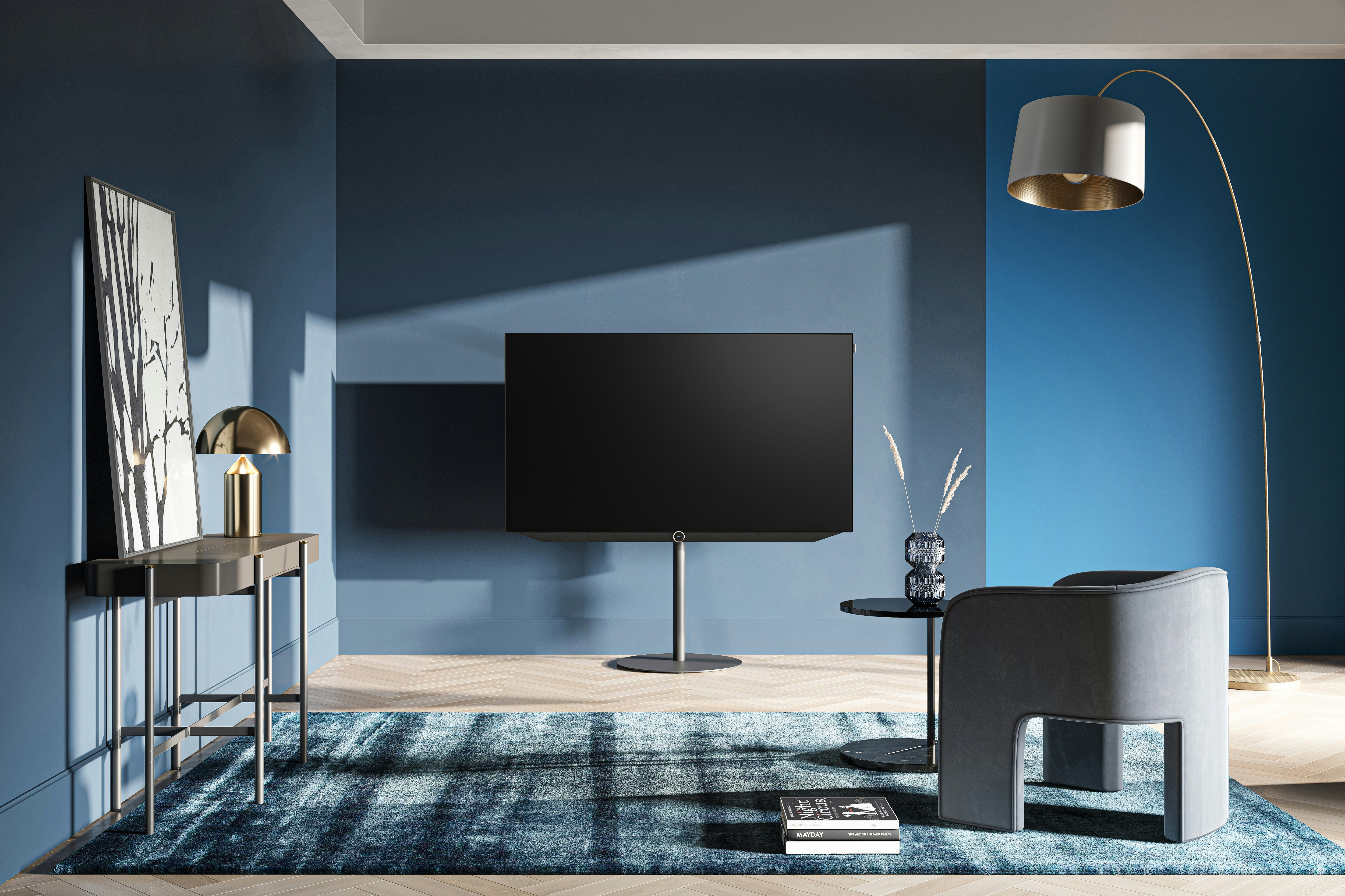 Large Samsung TV on modern TV stand in bright living room
