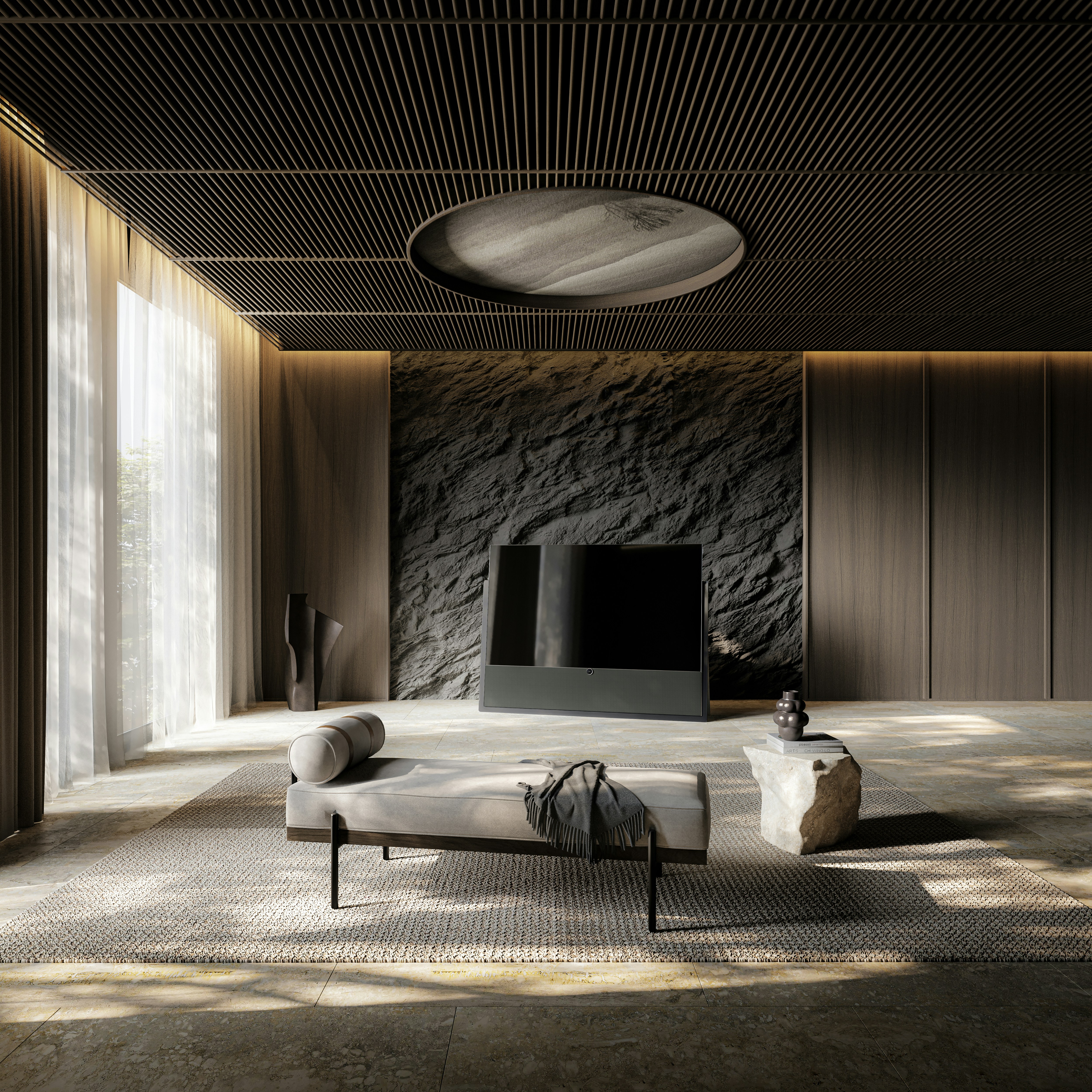 A modern, minimalist interior featuring a room with a textured stone wall and a sleek, black television. A daybed with a throw blanket is positioned centrally on a woven rug. To the right, a small stone table holds decorative objects, and sheer curtains allow soft natural light to filter through.