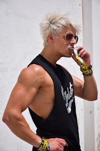 a man drinking- topic-Calorie Needs for Muscle