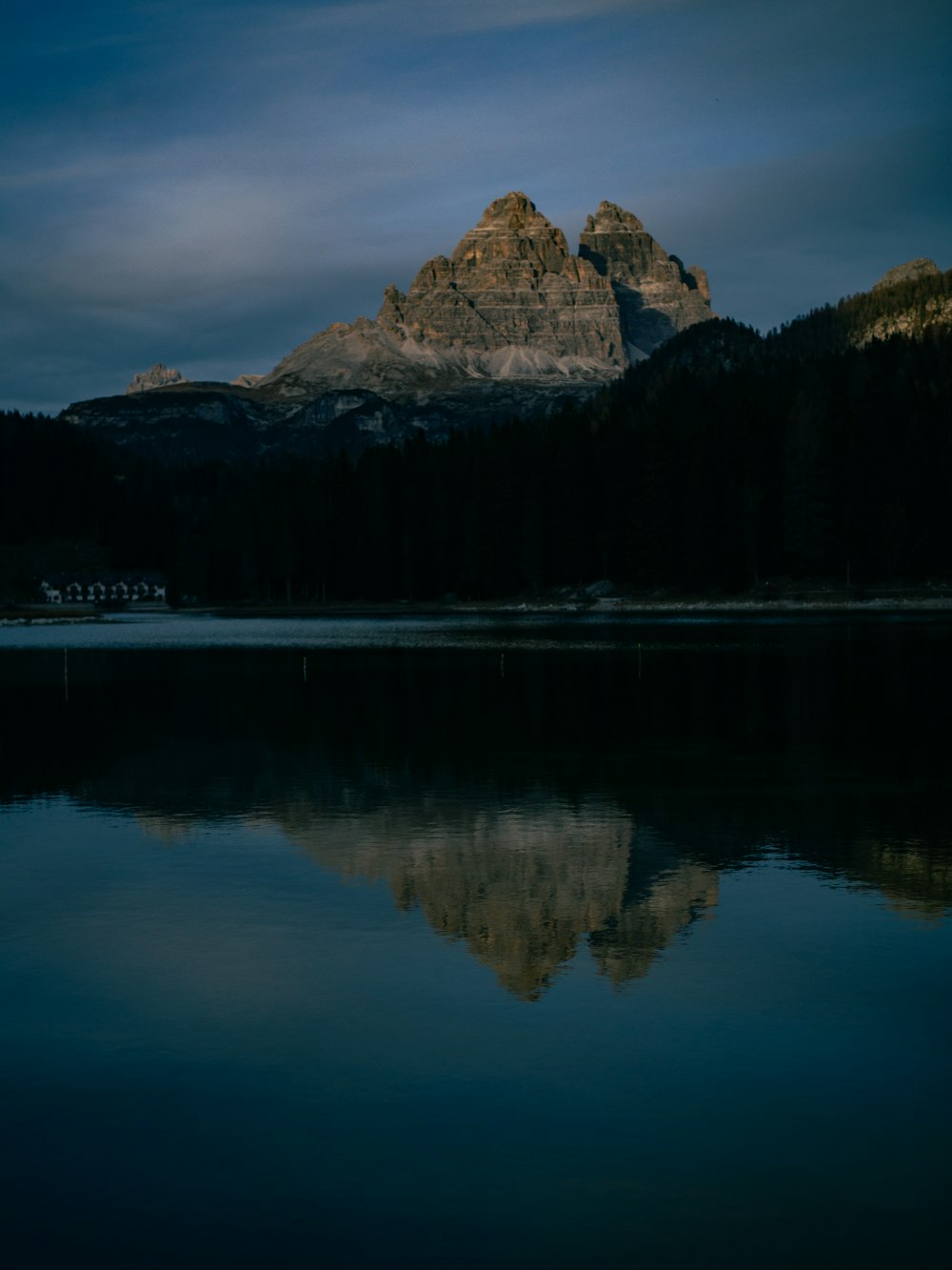 a lake with a mountain in the background