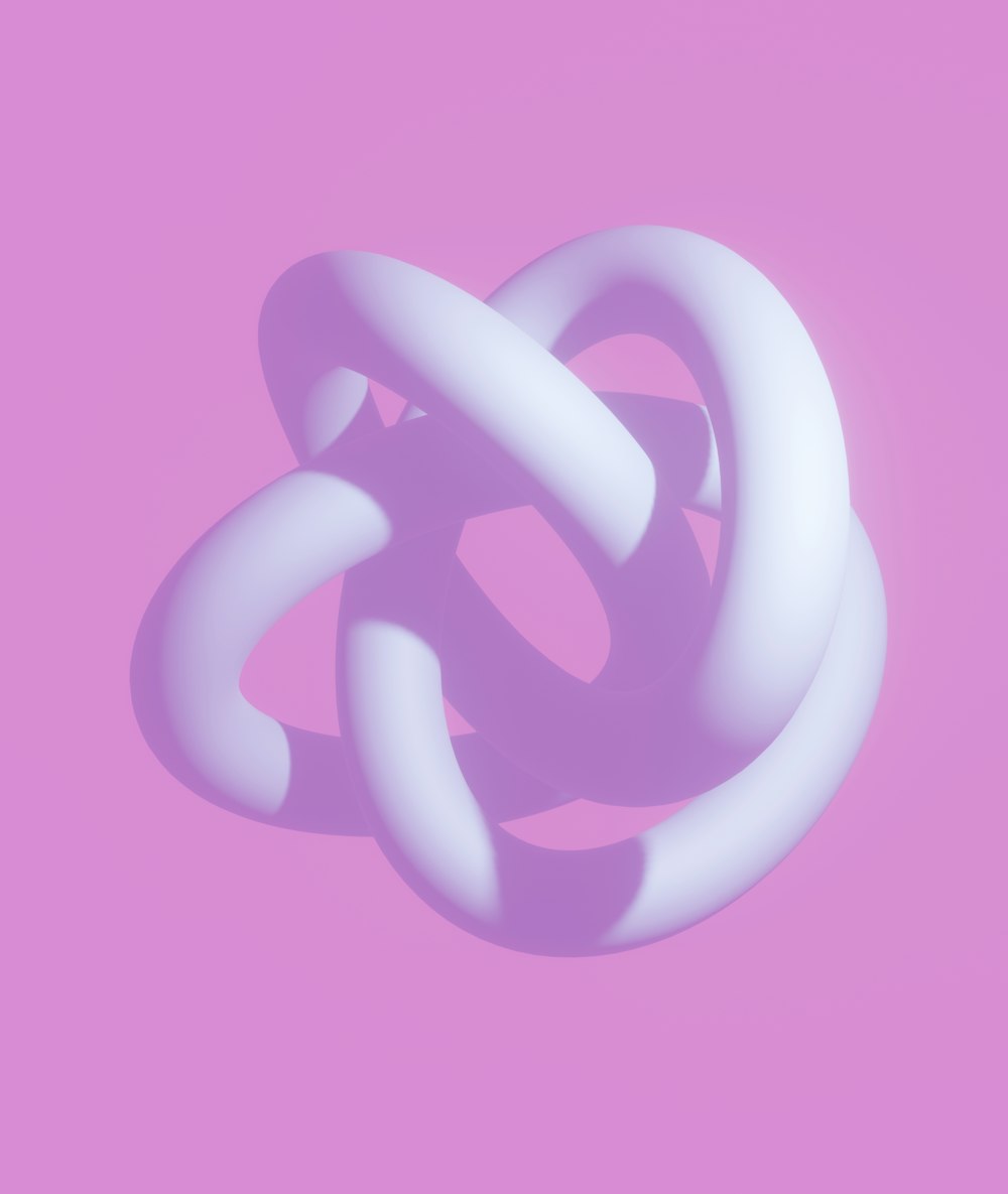 a white object on a pink background