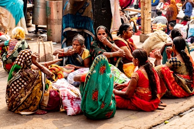 a group of women sitting next to each other