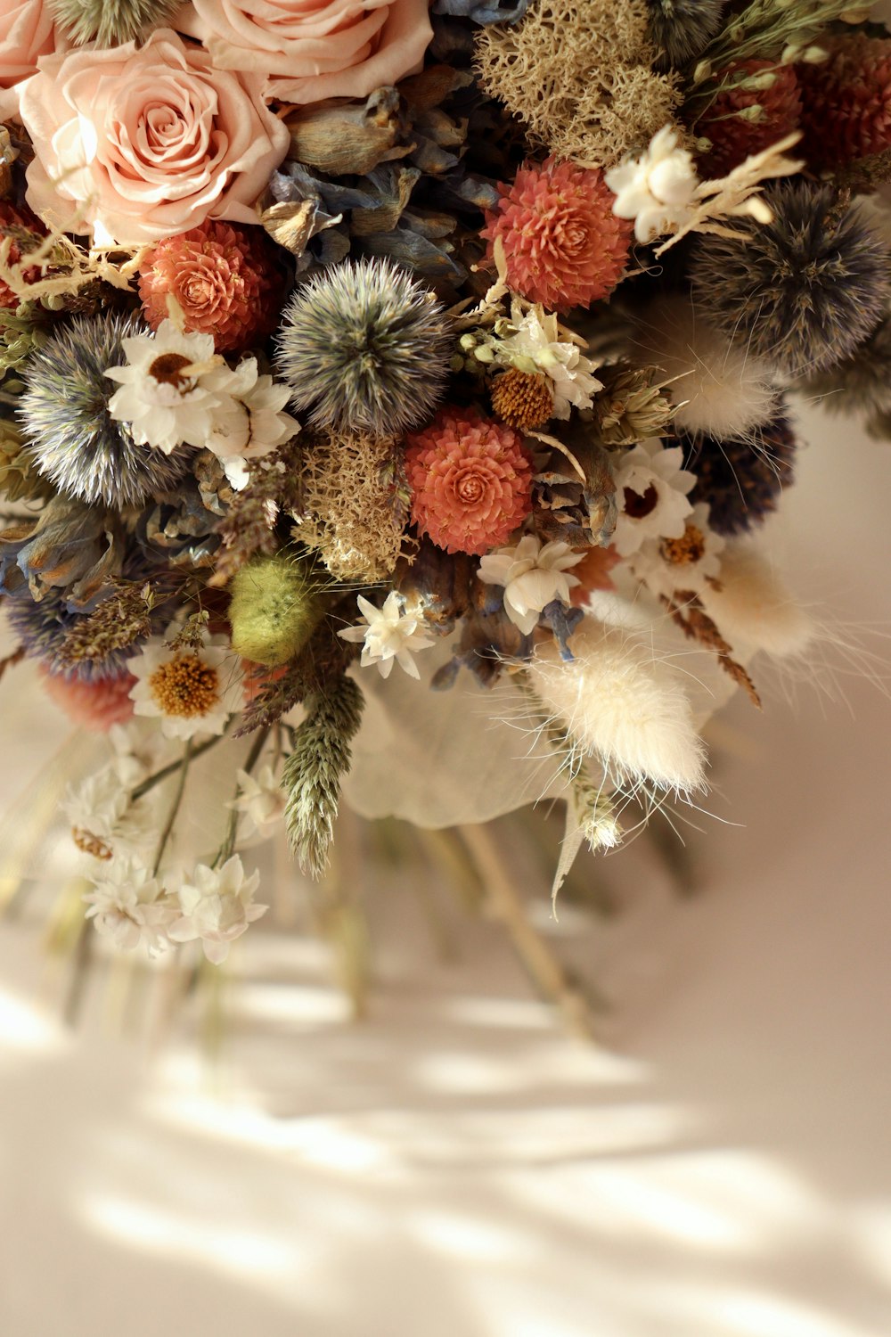 a bouquet of flowers sitting on top of a table