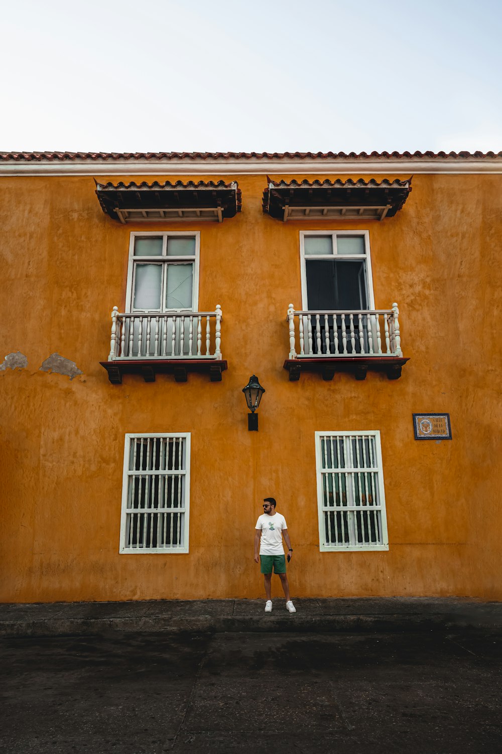 a person standing in front of a building