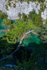 A scenic view of an alternative tourism destination with travelers exploring nature.