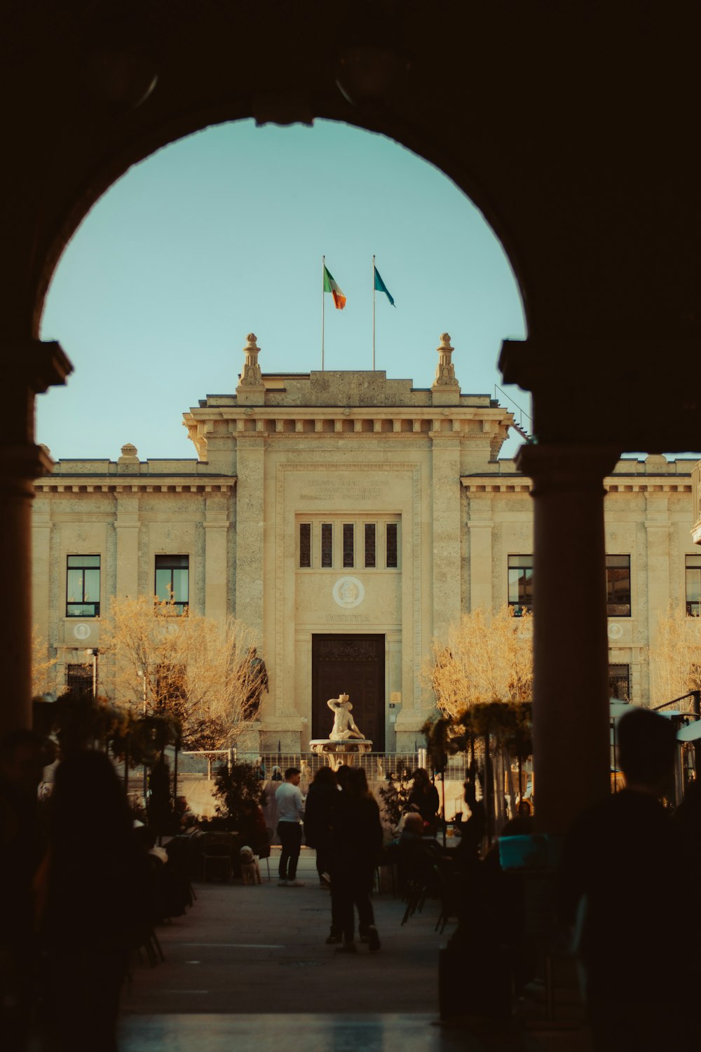 a large building with a flag on top of it