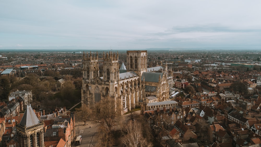 an aerial view of a city with a cathedral