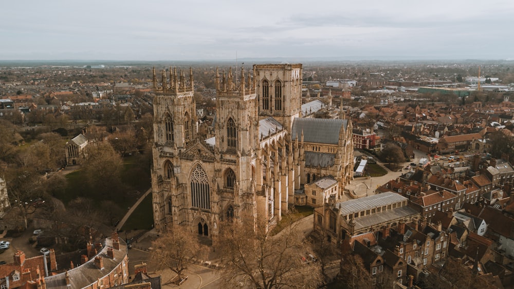 an aerial view of a large cathedral in a city