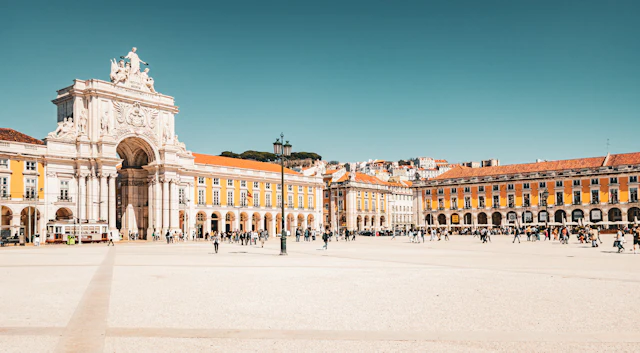 Praca do Comercio with the Rua Augusta Arch and the yellow arcaded buildings lining the square