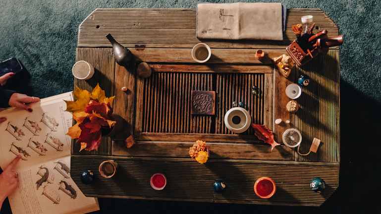 An overhead view of multiple vivanexa items arranged artistically on a wooden table.