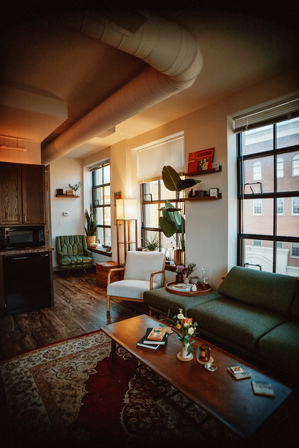 Living room filled with furniture and a large window