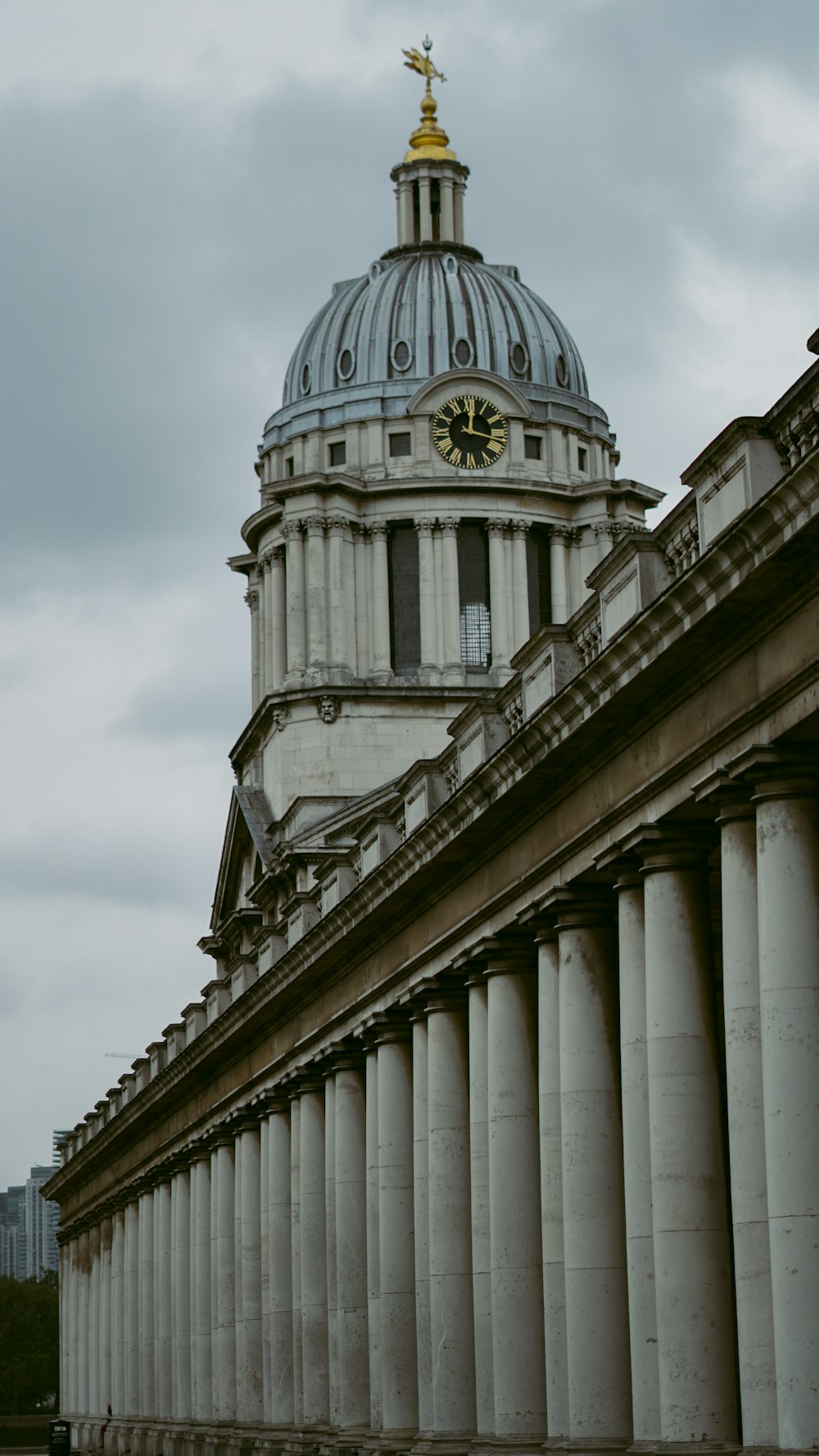 a large building with a clock on the top of it