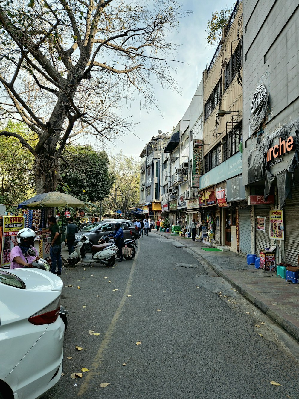 a street with cars parked on both sides of it