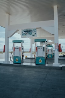 a couple of gas pumps sitting next to each other