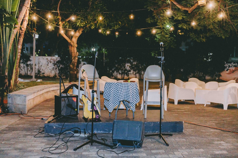 a group of chairs sitting on top of a patio