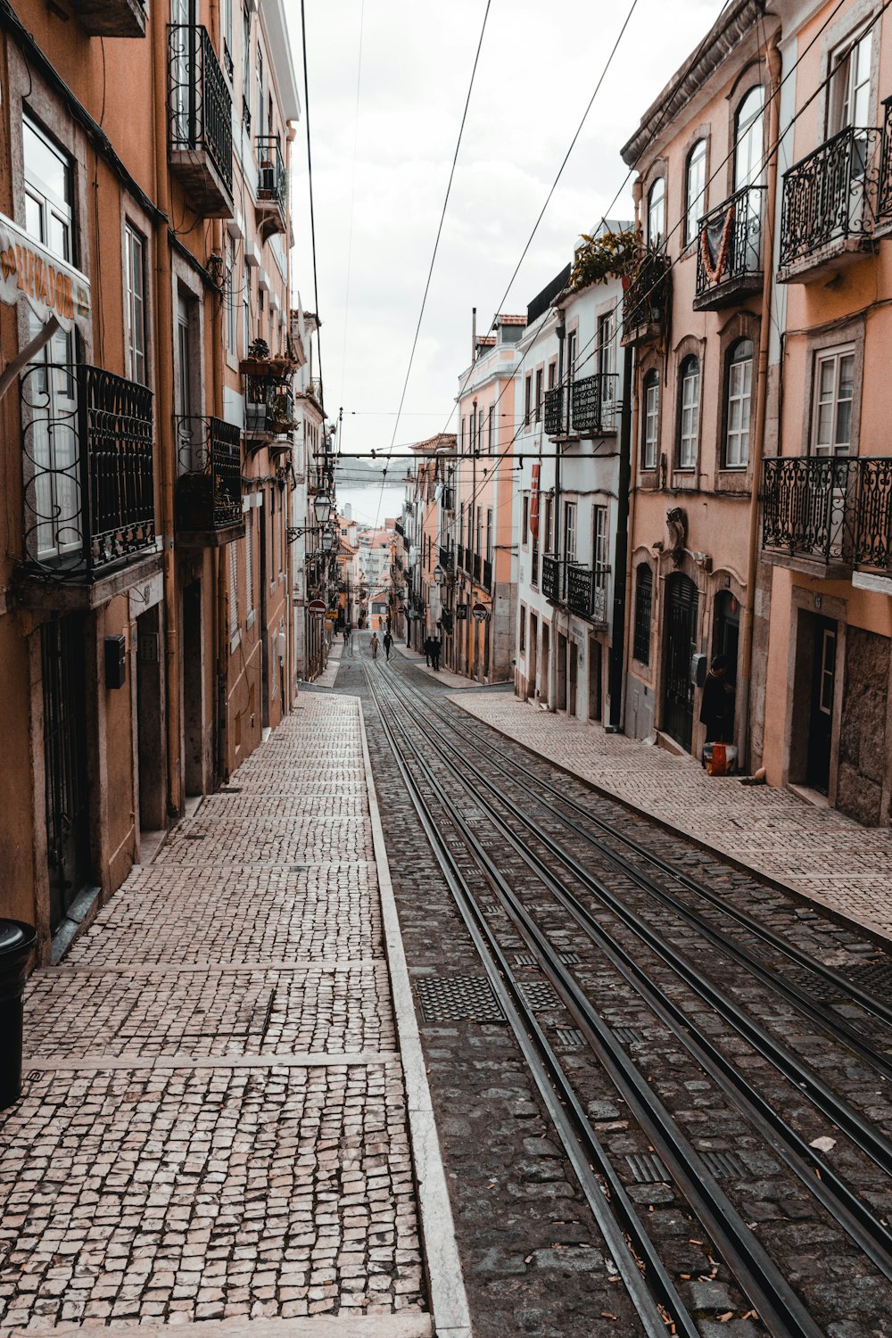 a street with a train track going through it