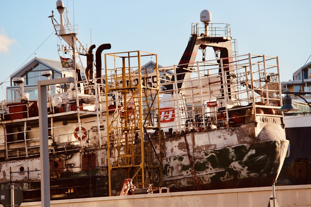 a large boat sitting on top of a dry dock
