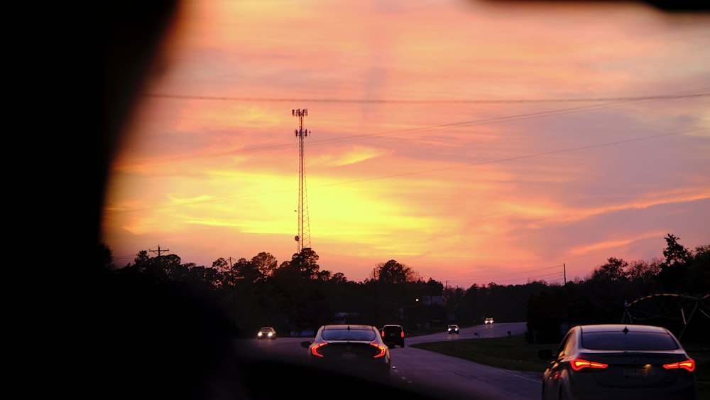 a view of a sunset through a car window