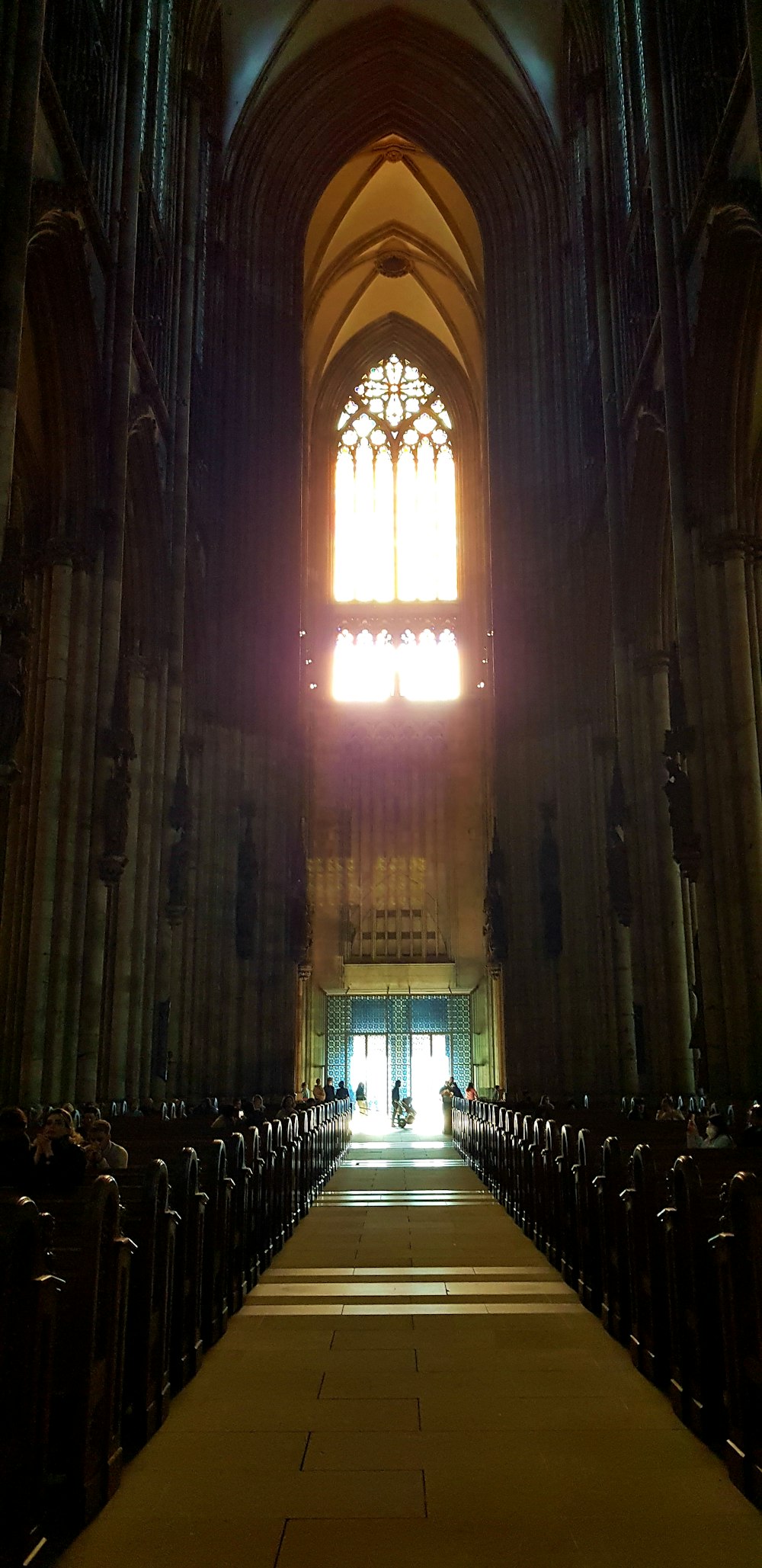 a large cathedral with a very tall window