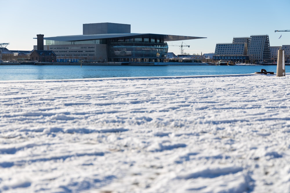 a view of a body of water with a building in the background