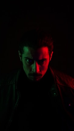 A greenlight pitch deck slide featuring a dramatic lighting setup on a character.