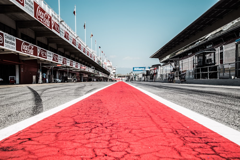 a race track with a red and white line painted on it