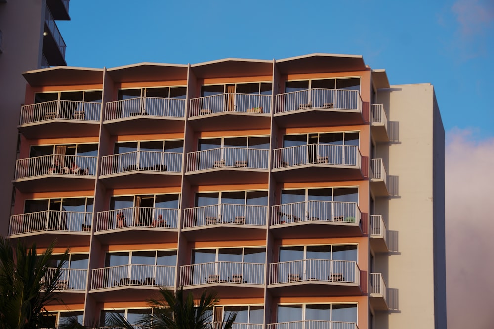 a tall building with balconies and balconies on the balconies