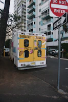 The red, blue, yellow, and white food truck 'Galipan' parked with a mountain backdrop.