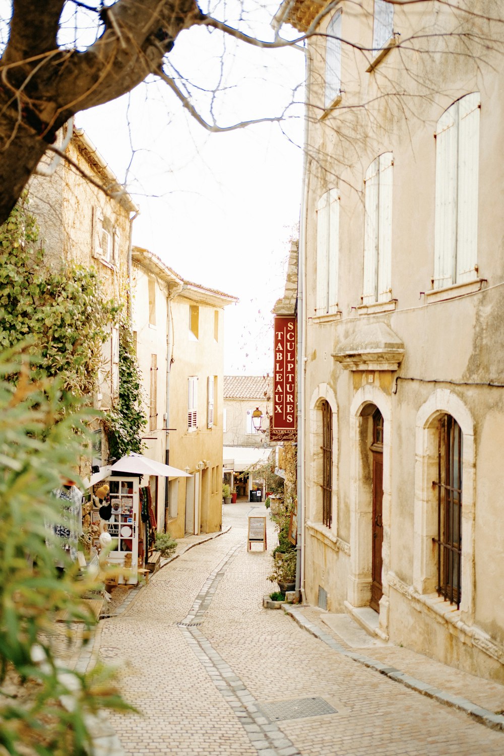 a cobblestone street in a small town