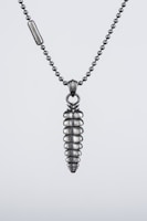 Stainless steel necklace with a modern minimalist pendant