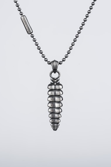 A beautifully crafted necklace made from upcycled bicycle chains.
