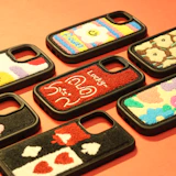 a group of cell phones sitting on top of a table