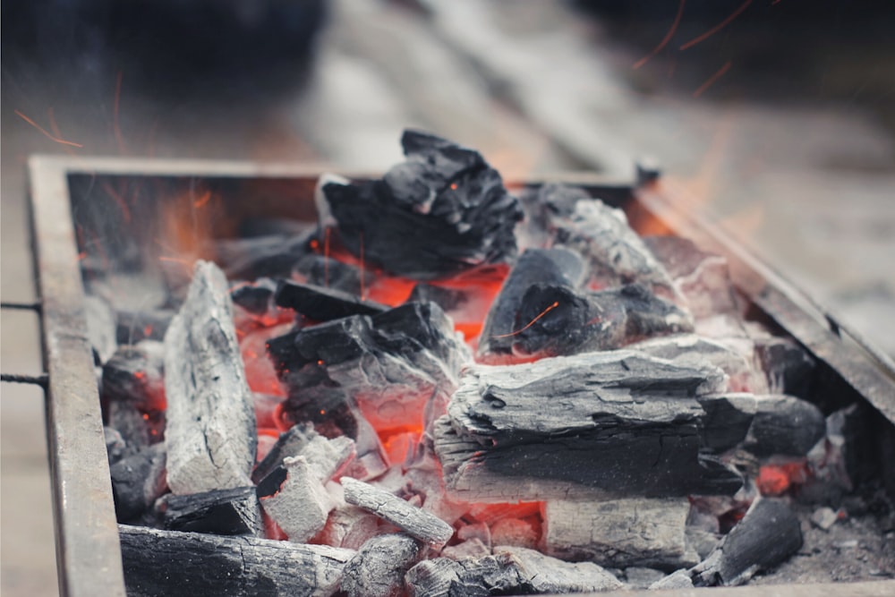 a close up of a fire pit with coal