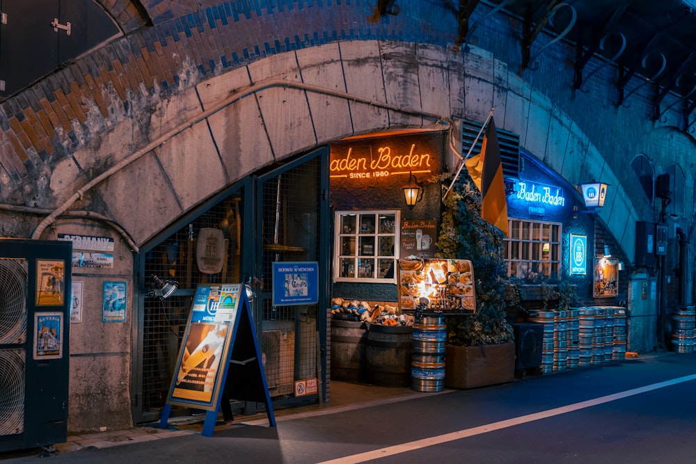 a street corner with a sign and a store