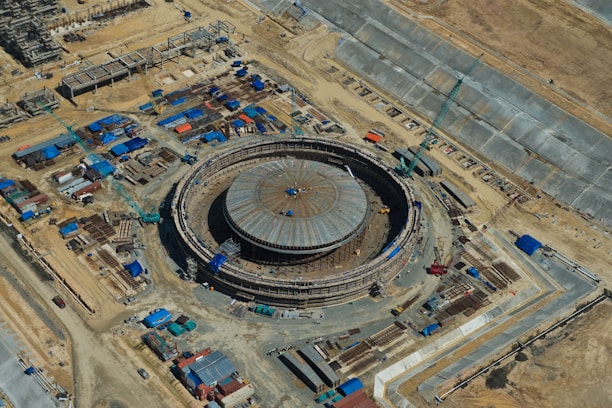 an aerial view of a large building under construction