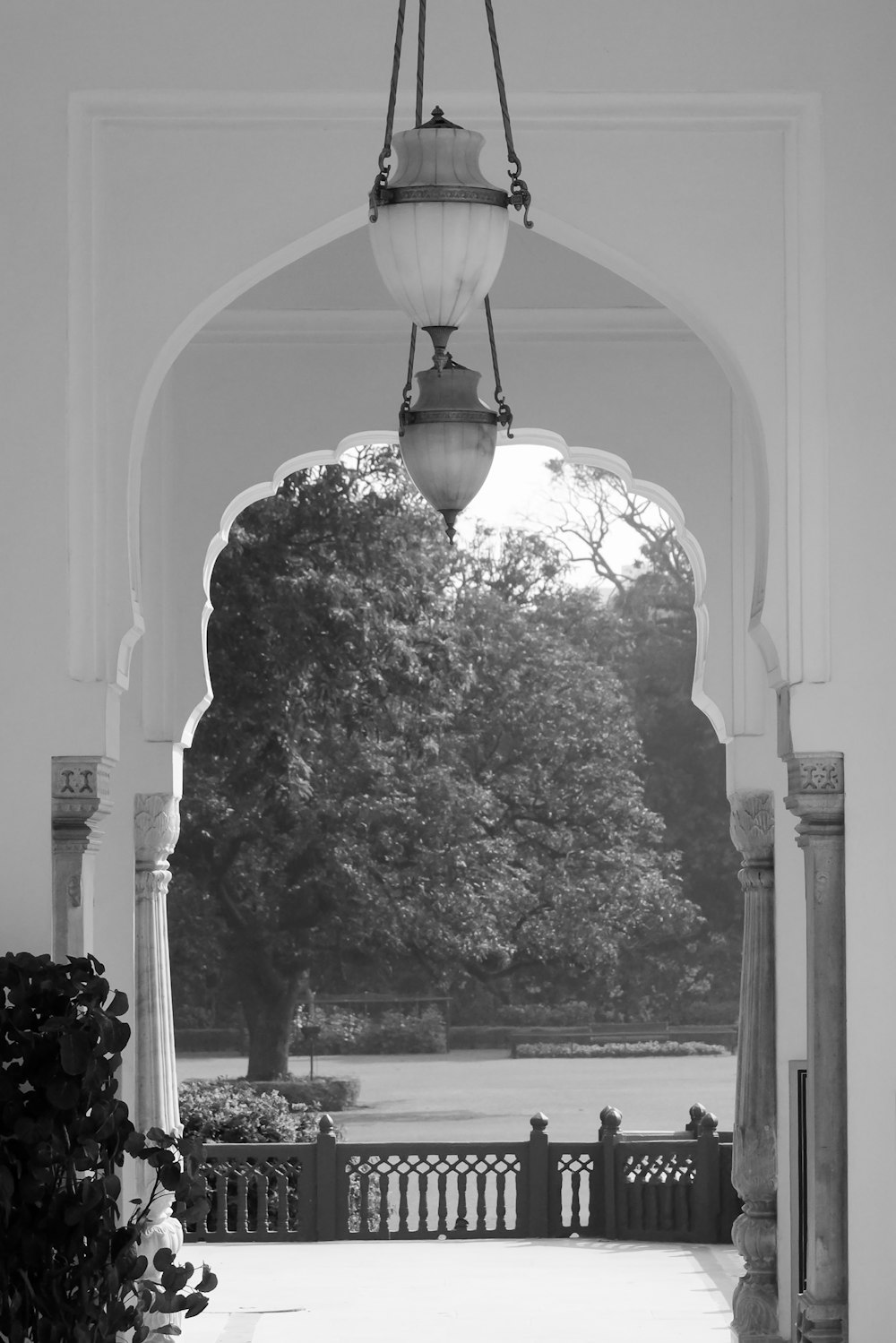 a black and white photo of an archway