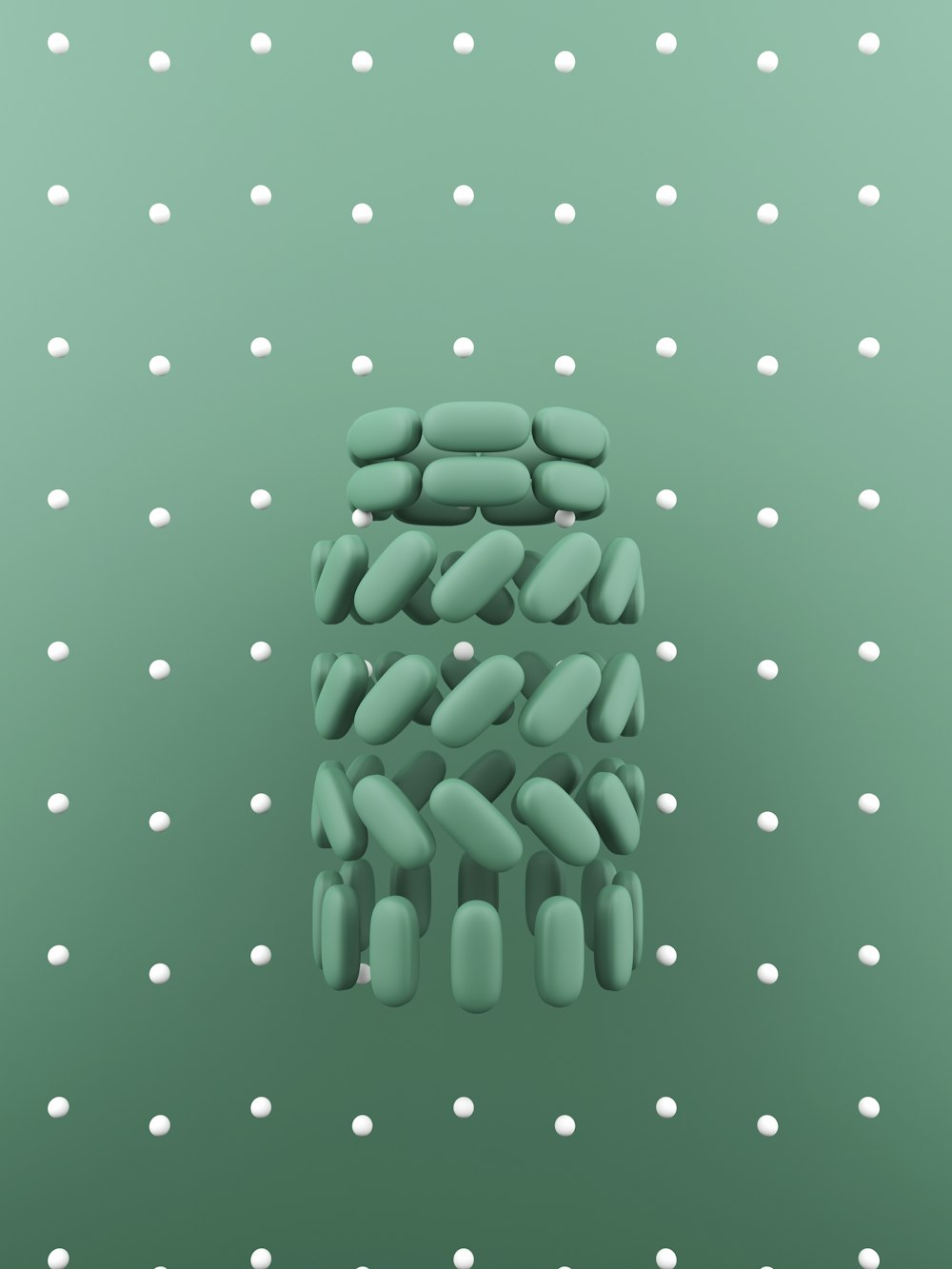 a group of pills sitting on top of a green surface