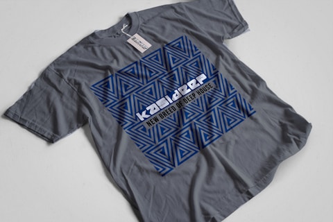 a gray shirt with a blue triangle on it