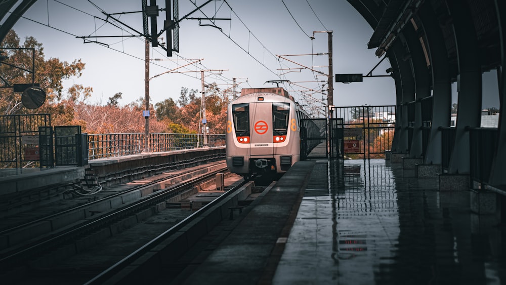 a train is pulling into a train station