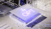 A stylized, futuristic circuit board design featuring a glowing chip with the letters 'GPT' prominently displayed. The environment is illuminated with neon lights and numerous intricate circuit patterns reflecting cutting-edge technology.