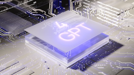 A stylized, futuristic circuit board design featuring a glowing chip with the letters 'GPT' prominently displayed. The environment is illuminated with neon lights and numerous intricate circuit patterns reflecting cutting-edge technology.