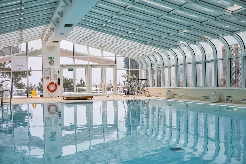 a large indoor swimming pool in a building