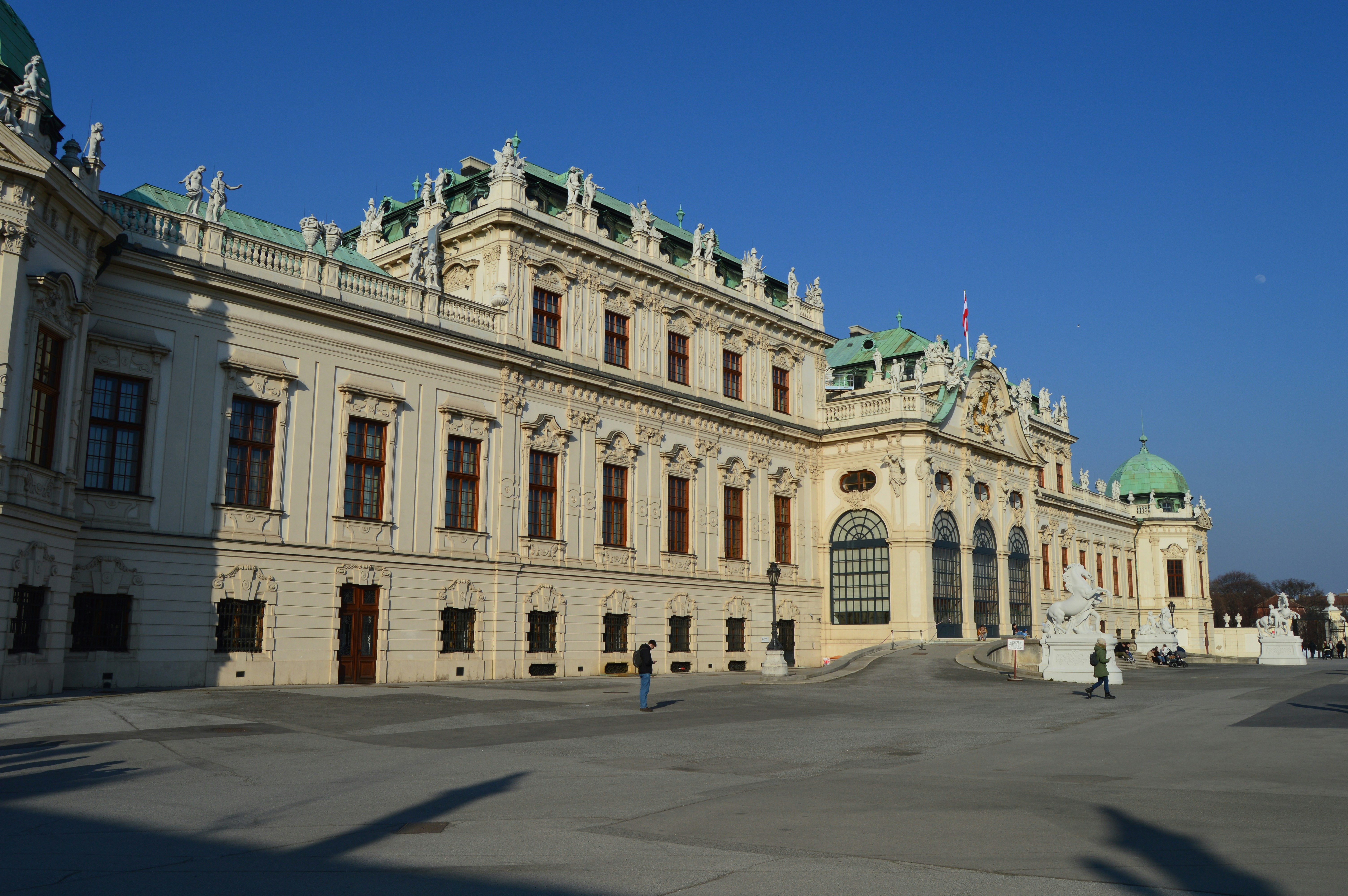 a large building with a green dome on top of it